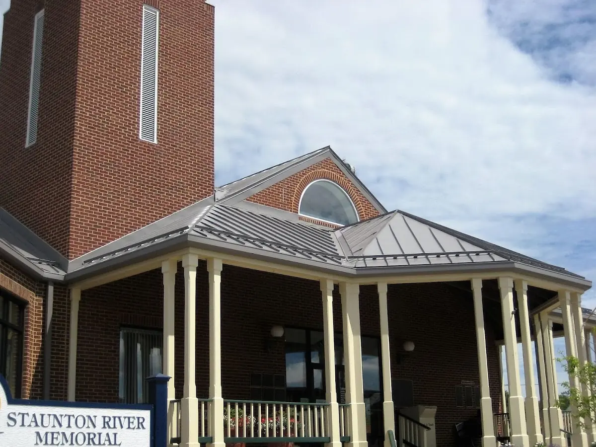 Skilled roofing craftsmen working on a residential roof in Winder
